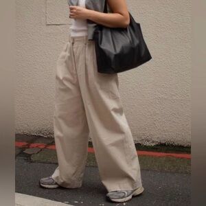 COS Wide-Leg Pleated Pants in Beige